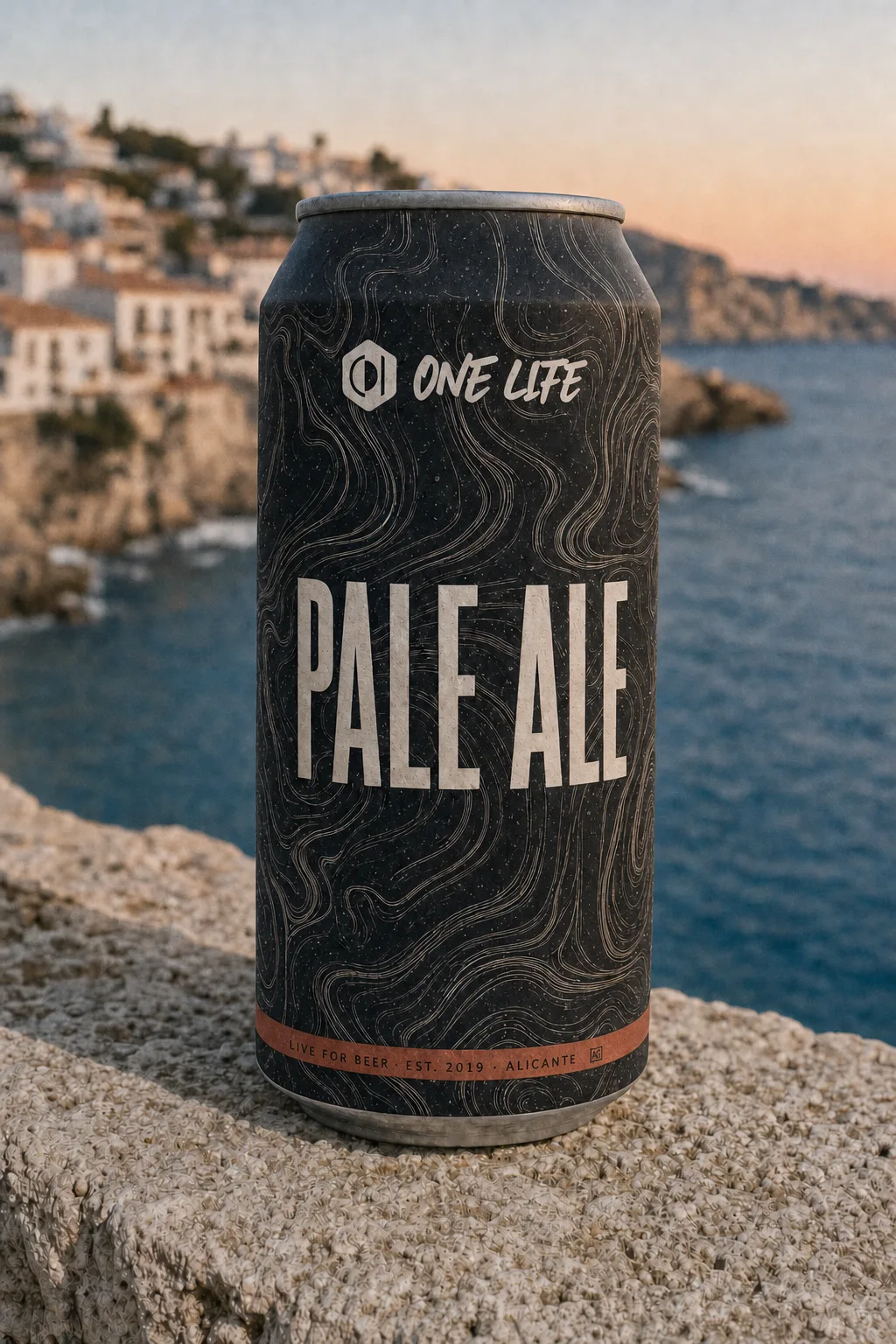 Render of a One Life Pale Ale can on a limestone ledge above a Mediterranean village at dusk